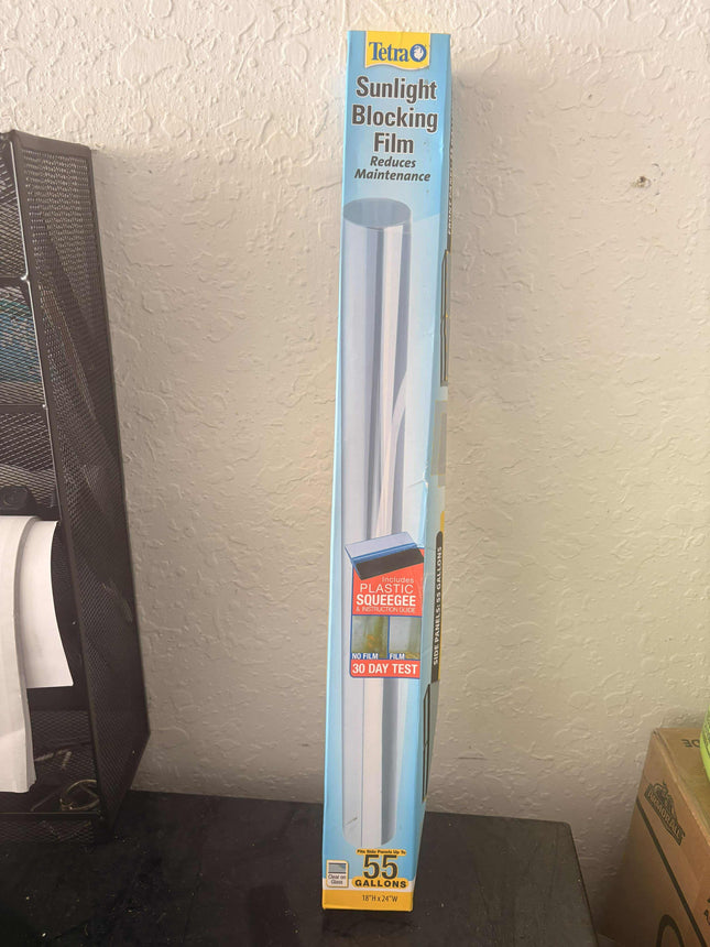 Retro Aquatics Tetra Sunlight Blocking Film for 55-gallon tanks, shown covering aquarium surface to reduce sunlight exposure.