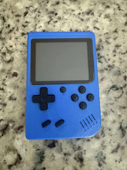 Mini Retro Handheld Game Console by Shop Market Deals with colorful buttons and a small screen, featuring 400 classic video games.