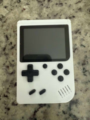 Mini retro handheld game console from Shop Market Deals with colorful buttons and a screen, loaded with 400 classic video games.