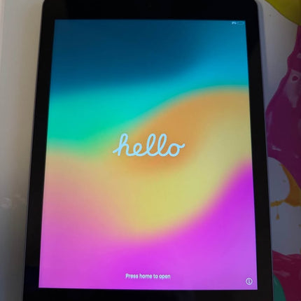 Apple iPad 6th Generation with 128GB storage, showing the device's front screen and sleek design.